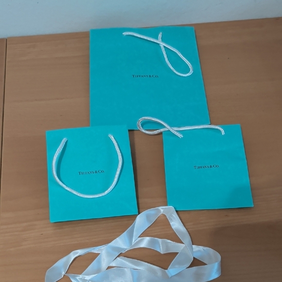 Tiffany & Co. Turquoise Bags with White Ribbons - Picture 1 of 1